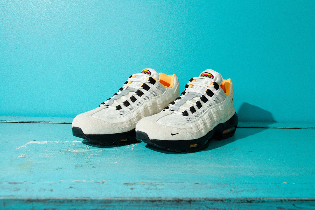 Nike SB Air Max 95 'Club 58'
Shoe in Sail and Laser Orange on teal background