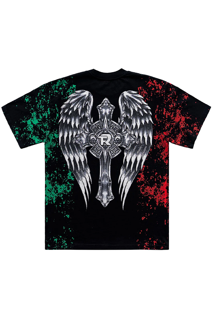 A black short-sleeve t-shirt with a large graphic on the back featuring a silver angel winged cross. The left side of the shirt has a green paint splatter effect, and the right side has a red paint splatter effect.