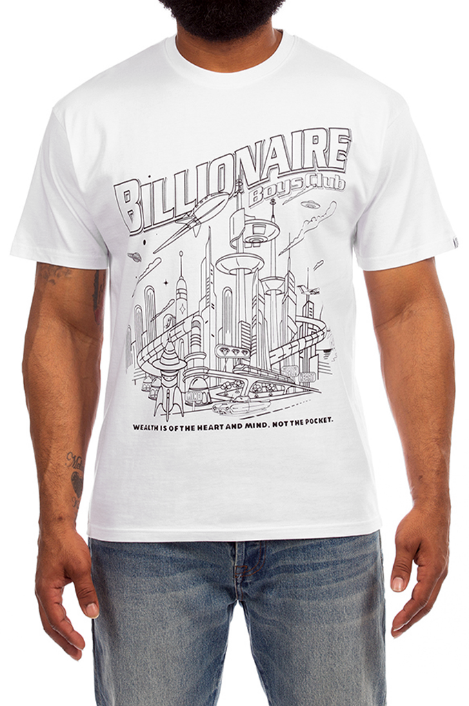 A man wearing a white short-sleeve graphic t-shirt with a black line art design of a futuristic city and the text 'BILLIONAIRE BOULEVARD' and 'WEALTH IS NOT THE HEART AND MIND, NOT THE Pockets.' paired with blue jeans.#color_white