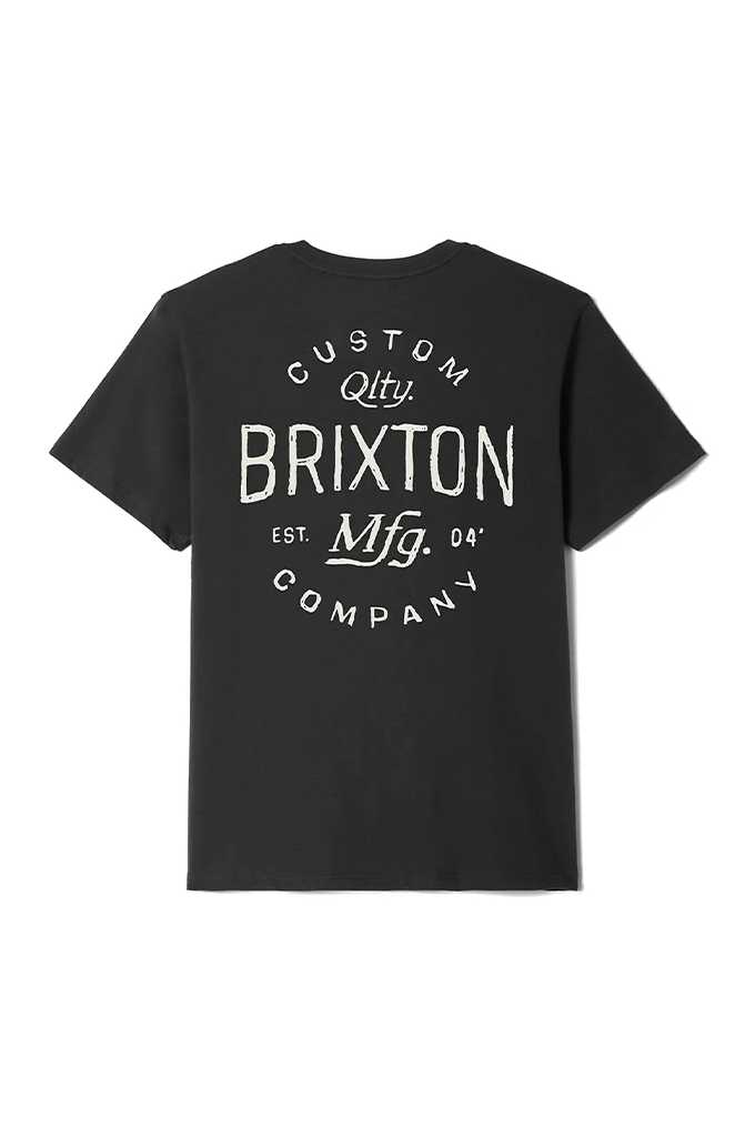 A black crewneck short-sleeve t-shirt laid flat against a white background, showing a large white graphic printed on the back. The graphic features the word "BRIXTON" written in a bold, hand-drawn font horizontally across the center. Arc-shaped text frames the top and bottom, reading "CUSTOM Qlty." above and "COMPANY" below. Flanking the word "Mfg." at the lower center are the details "EST." and "04’".