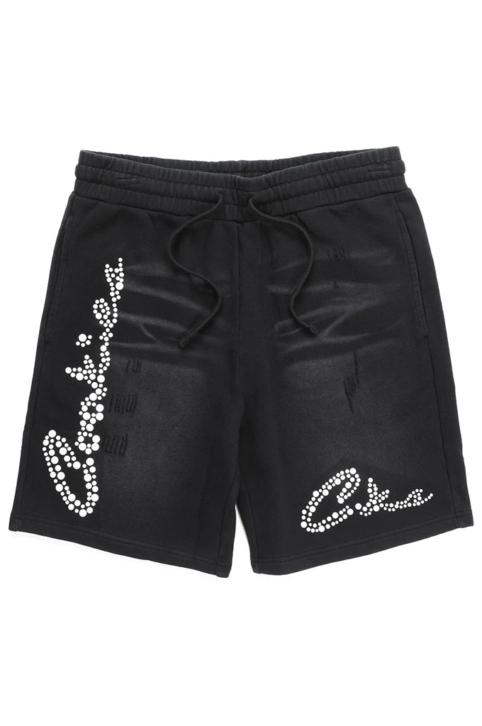 Black denim shorts featuring a white rhinestone script logo on the left leg and right thigh, with a matching black drawstring waistband.