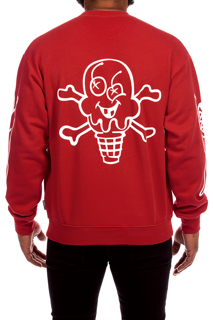 A rear view of a model wearing a american beauty redICECREAM Billionaire Boys Club Cones and Bones crewneck sweatshirt featuring a large white outline graphic of a skull-and-crossbones ice cream cone on the back. #color_american-beauty