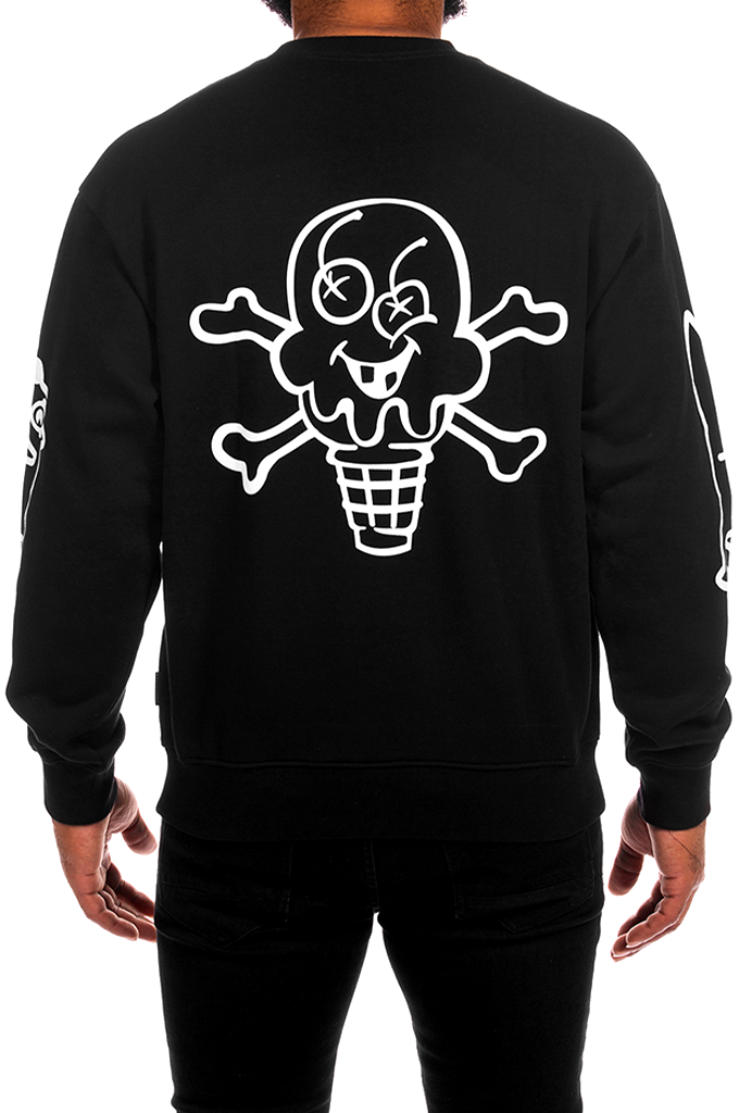 A rear view of a model wearing a black ICECREAM Billionaire Boys Club Cones and Bones crewneck sweatshirt featuring a large white outline graphic of a skull-and-crossbones ice cream cone on the back. #color_black
