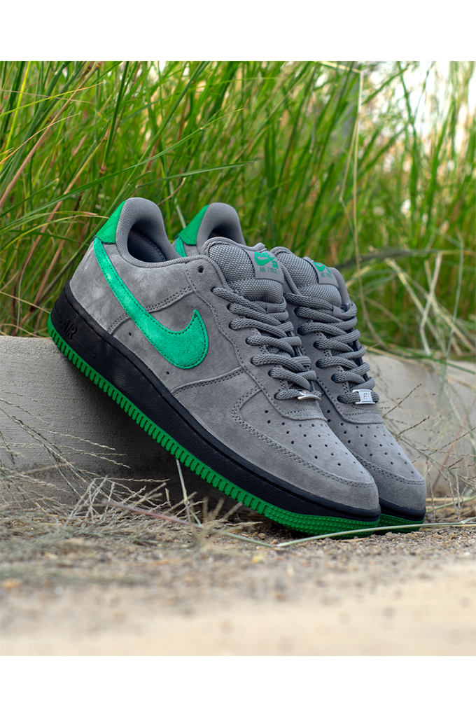 Nike SB Air Force 1 Low SE Nocturnal City Pack sneakers in cool grey suede with a court green swoosh and black midsole.