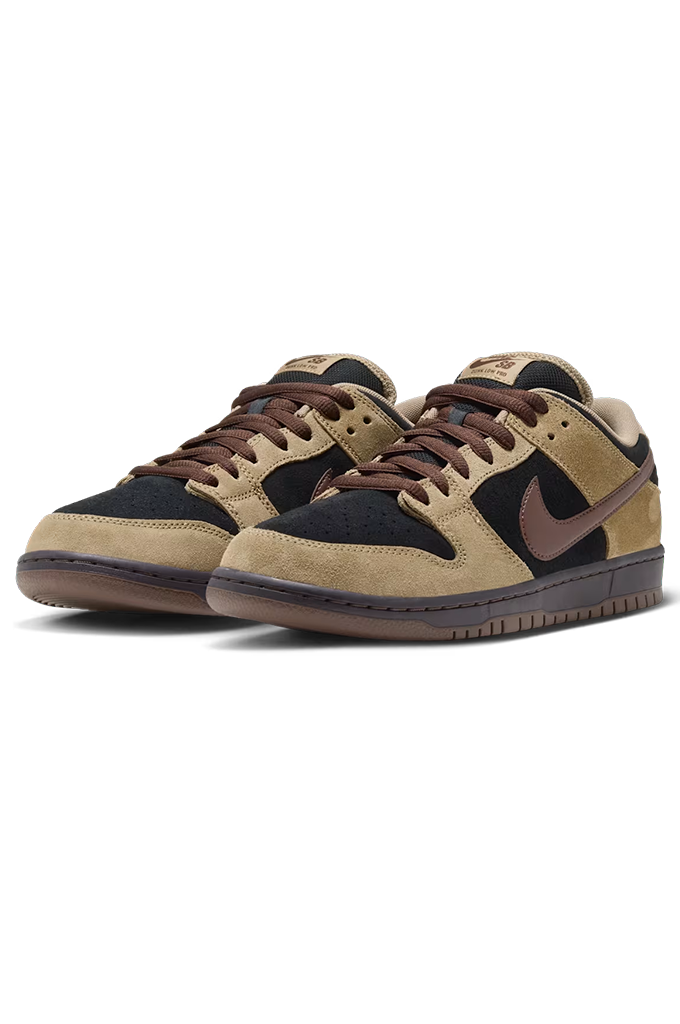 Side view of a Nike Dunk sneaker in a colorway of tan suede, black leather, and dark brown. The shoe features a tan suede upper, black leather overlays, dark brown laces, a dark brown Swoosh, and a dark brown gum sole, shown from a side profile view on a white background.