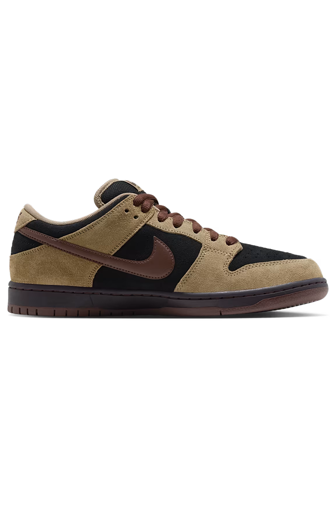 Side view of a Nike Dunk sneaker in a colorway of tan suede, black leather, and dark brown. The shoe features a tan suede upper, black leather overlays, dark brown laces, a dark brown Swoosh, and a dark brown gum sole, shown from a side profile view on a white background.