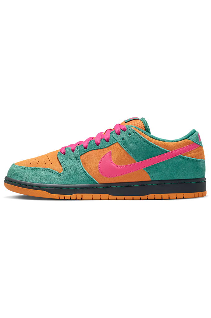 A Nike Dunk sneaker in a vibrant multicolor palette featuring teal green suede overlays, bright orange suede toe and heel panels, a hot pink Swoosh and laces, and a dark green and orange gum sole.