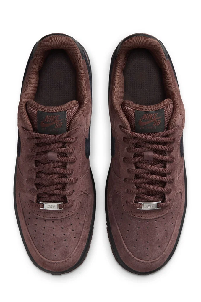 A pair of Nike Air Force 1 Low sneakers in a dark brown suede and leather combination, shown from a top-down view on a white background.