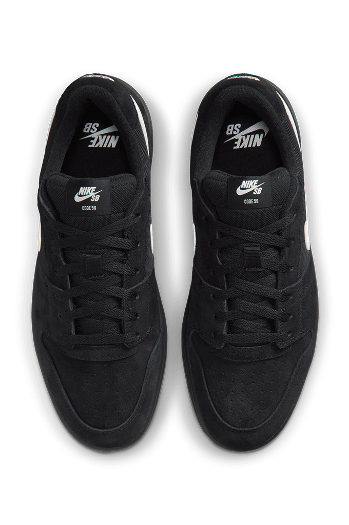 A pair of black Nike SB 1998 sneaker low-top shoes shown from a top-down view on a white background.