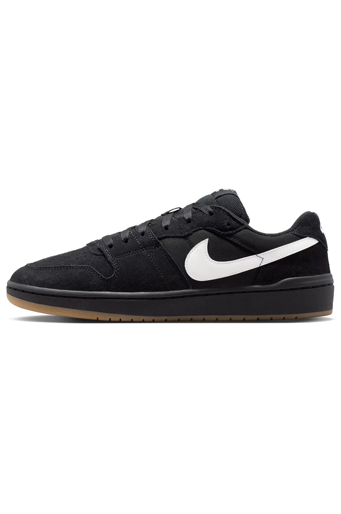 A black Nike low-top sneaker with a white Swoosh on the side, black laces, and a gum-colored outsole, shown against a plain white background.