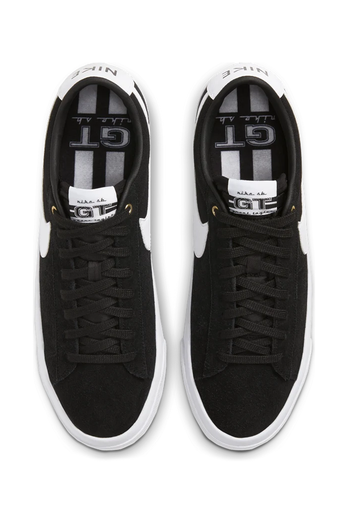 A pair of black and white low-top sneakers shown from a top-down view on a plain white background#color_black-white-black