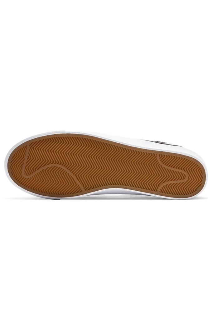 Sole of Nike sneakers in a gum tan color #color_black-white-black