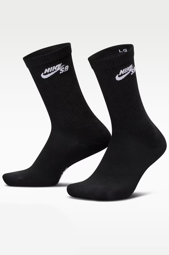 A pair of black Nike crew socks with white logos, displayed against a clean white background.#color_black