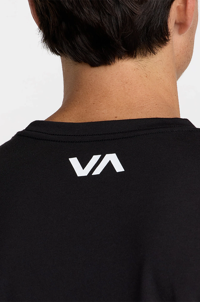 Close-up back view of a person wearing a black short-sleeve T-shirt with a white stylized 'VA' logo printed on the upper back, against a light gray background.