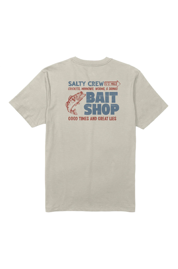 A light beige crewneck t-shirt with a vintage-style fishing graphic on the back. The graphic features the text 'SALTY CREW BAIT SHOP' in blue and red, a red fish illustration, and 'GOOD TIMES AND GREAT LIES' underneath.
