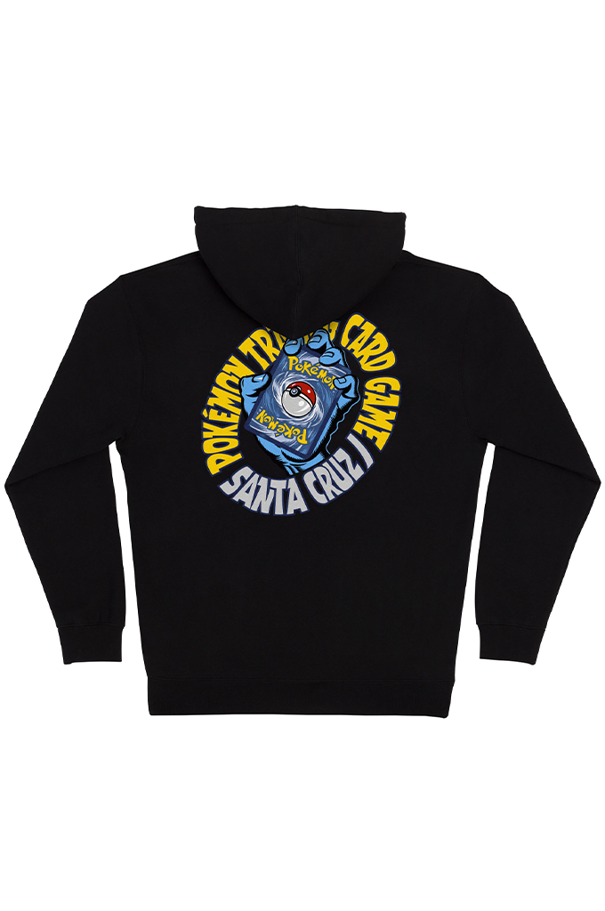 The back of a black Santa Cruz x Pokémon collaboration youth hoodie featuring a circular graphic with a blue Screaming Hand holding a Pokémon Trading Card Game card. #color_black