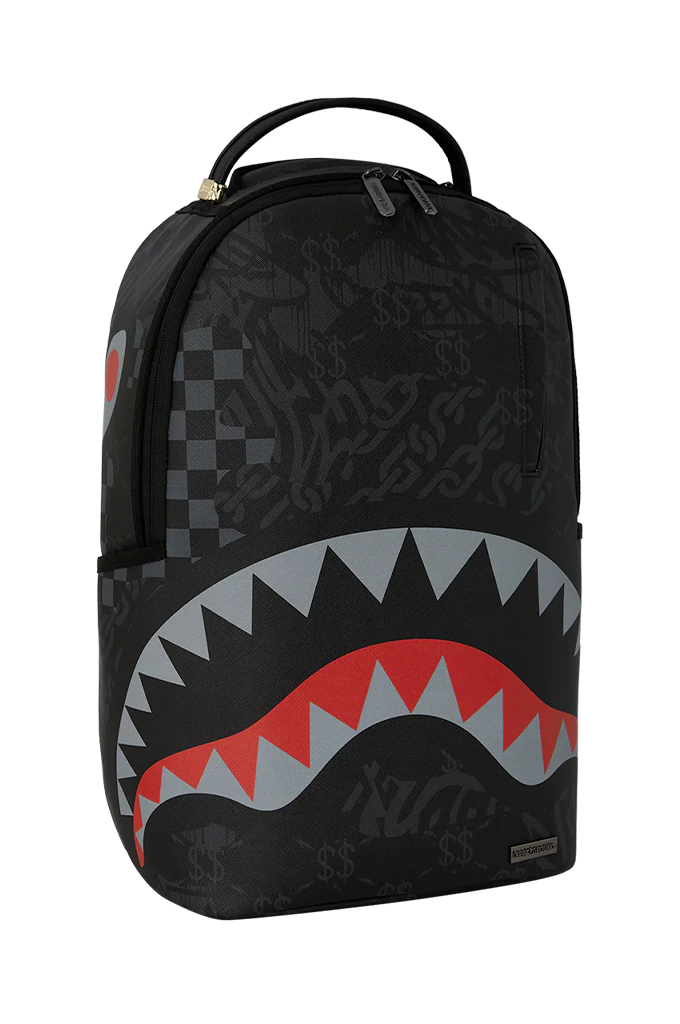 A black backpack featuring a large shark mouth graphic on the front with red and gray teeth, a subtle graffiti-style pattern, and a top carry handle.