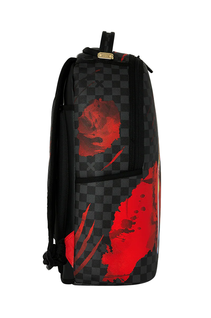 A black and dark gray checkered backpack with a red rose graphic and red paint-splatter style print on the front, shown against a plain white background.