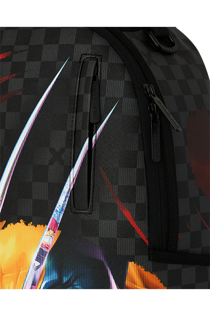 Close-up of a black backpack featuring a dark gray checkerboard pattern, a vertical zippered pocket, and a colorful abstract graphic print with orange, blue, and red accents.