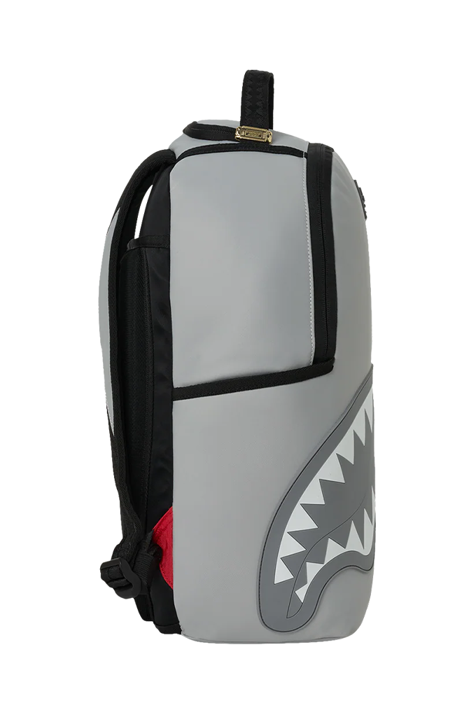 A gray and black Shark Bay backpack with a shark mouth graphic on the lower front, shown against a plain white background.