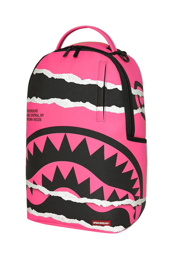 A pink and black Shark mouth backpack with a graphic design featuring torn paper effects and a shark mouth motif, shown on a plain white background.