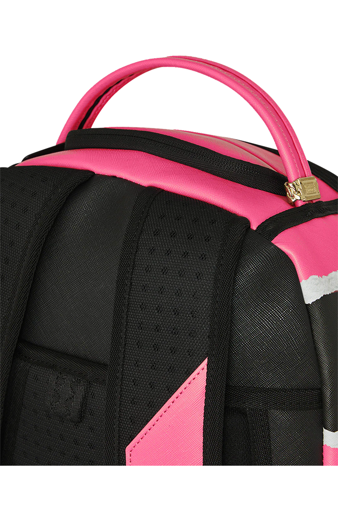 Close-up of a backpack showing the top handle, black mesh back padding, and bright pink accents on a white background.