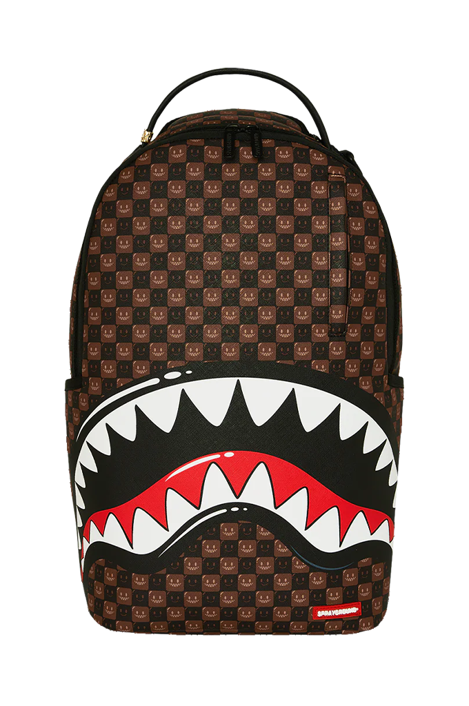 A Sprayground Shark backpack featuring a brown and black patterned body with a large shark mouth graphic in black, white, and red on the front, set against a plain white background.