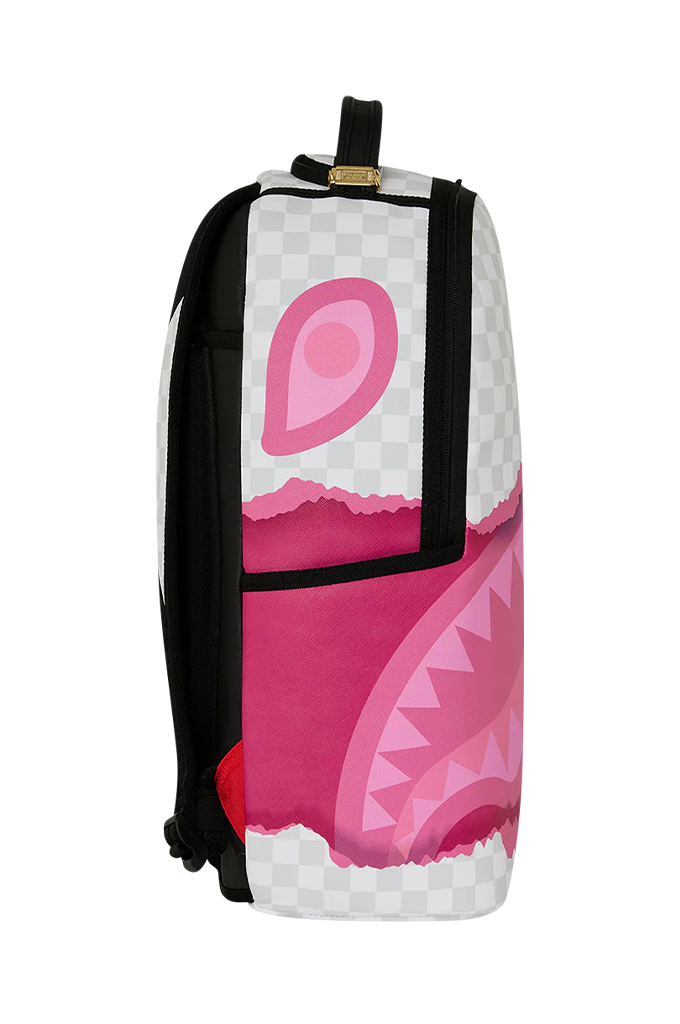 A Sprayground Shark backpack featuring a pink and white shark mouth graphic on a white background.