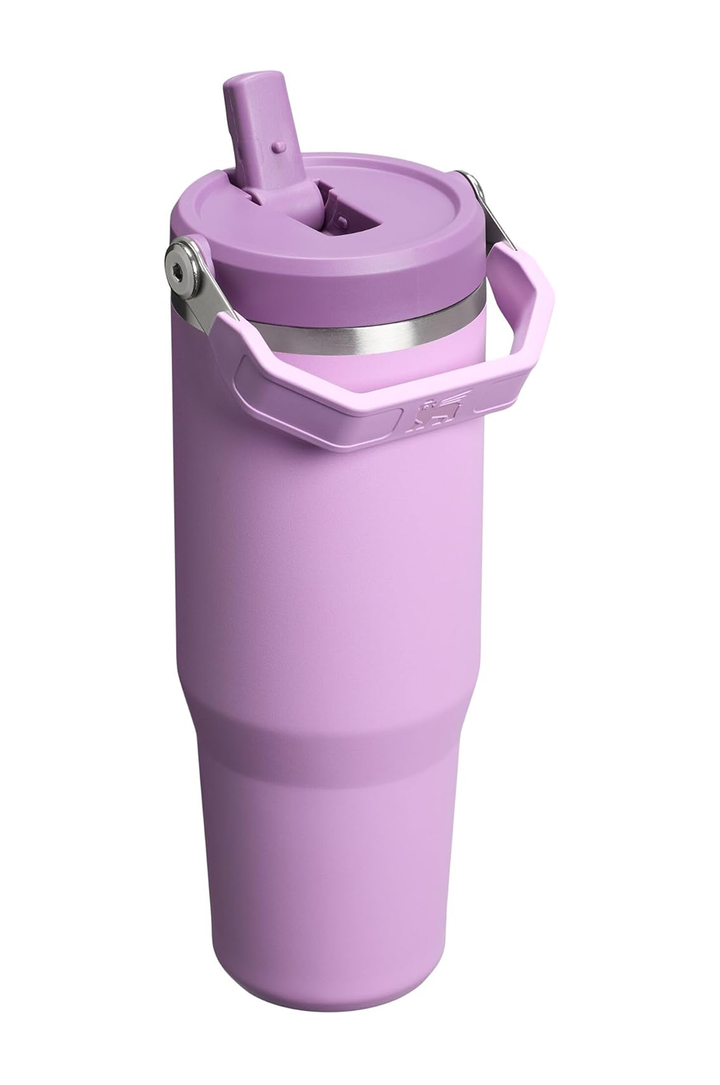 A lavender purple insulated travel tumbler with a matching lid, carrying handle, and flip straw spout, shown on a plain white background.#color_lilac