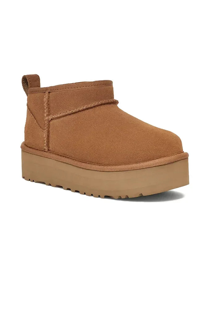 Chestnut Brown suede platform boot on a white background