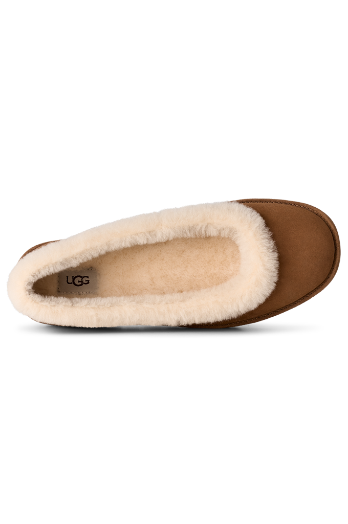 A single UGG slipper shown from a side profile view, featuring a brown suede-like exterior and a thick, fluffy cream shearling lining.
