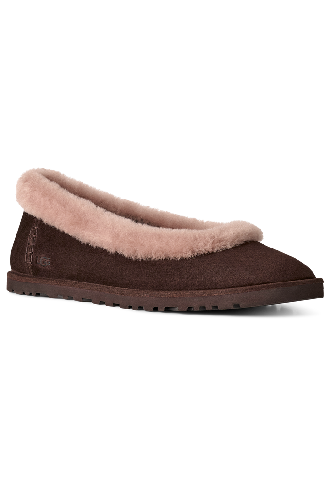 A single dark brown slip-on slipper with a soft blush pink faux-shearling collar, shown from a side profile on a white background.