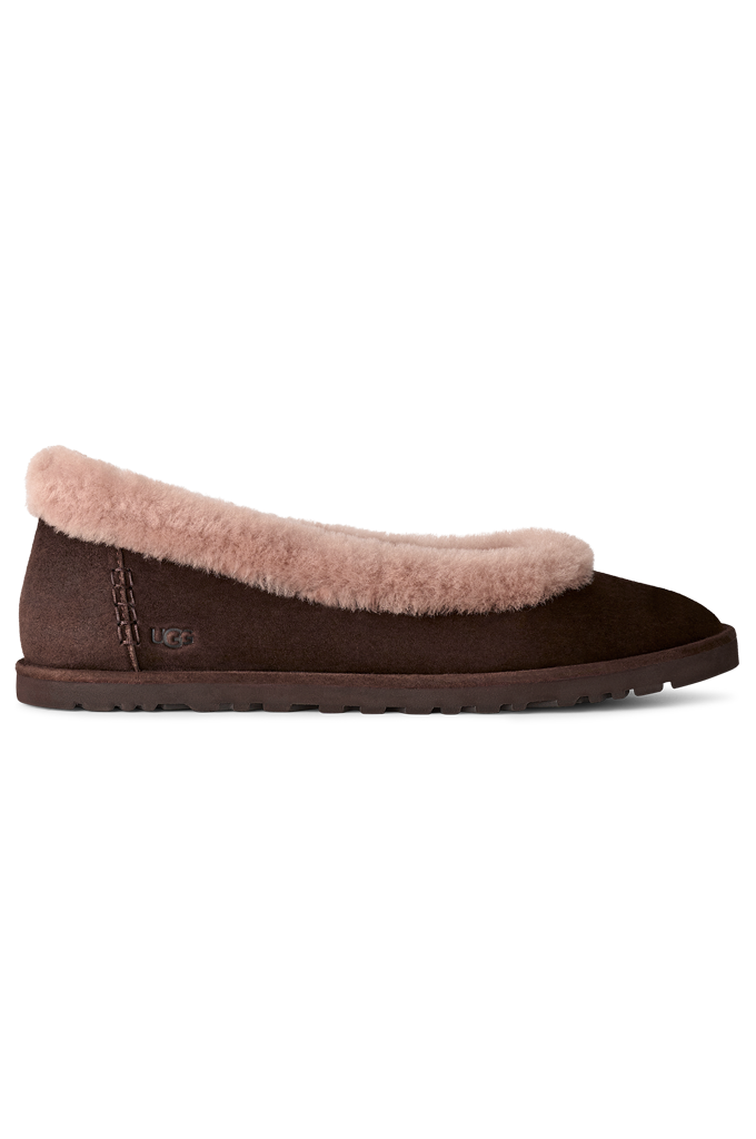 A single dark brown slip-on slipper with a soft pink shearling-style collar, shown in a side profile on a white background.