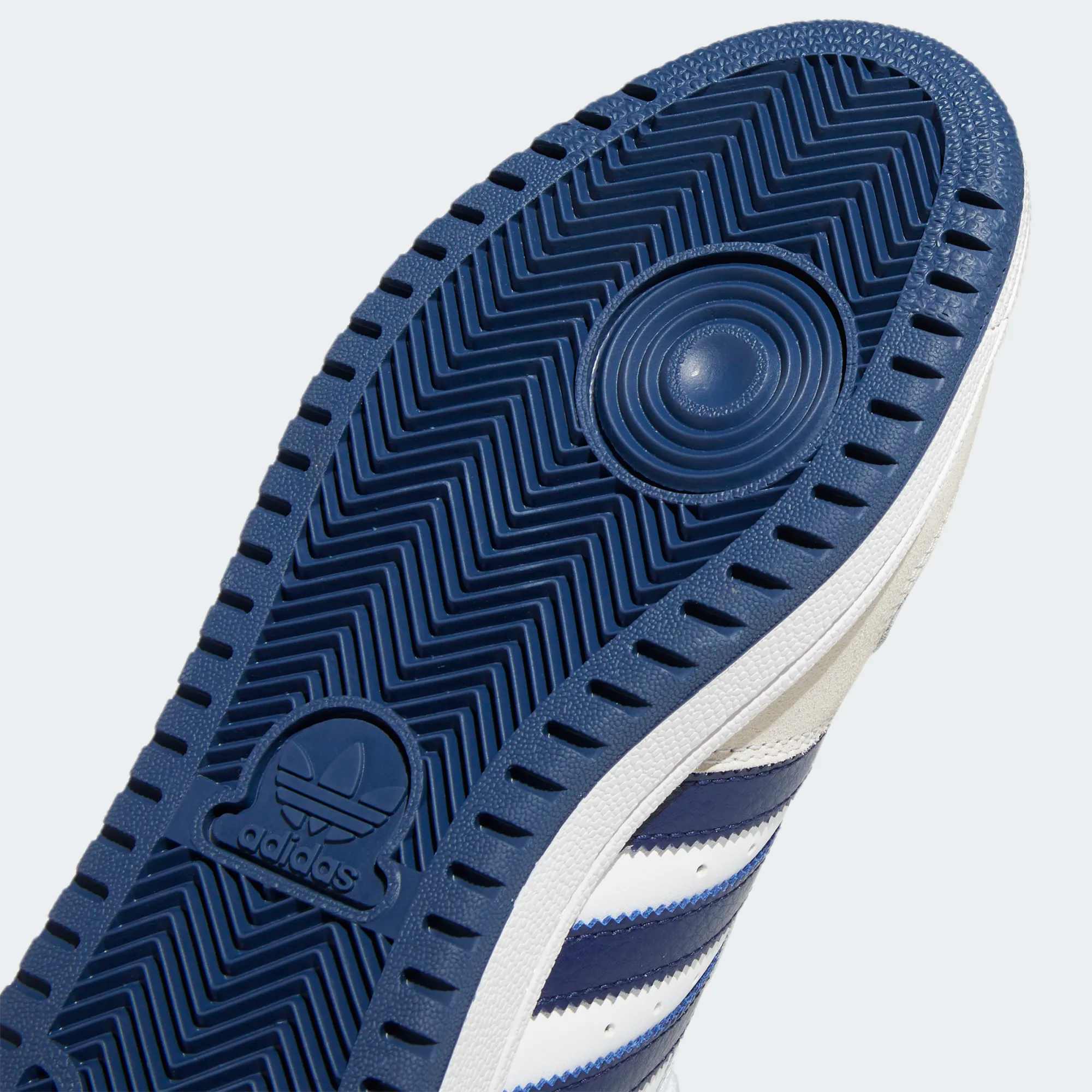 White and navy sales blue adidas shoes