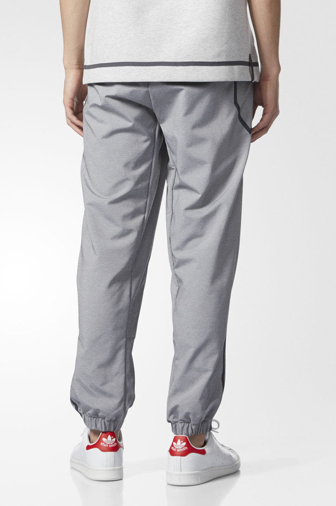 Adidas taped track pants on sale